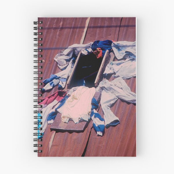 Item preview, Madagascar: Drying Clothes In Window On Tin Roof designed and sold by DEC02.