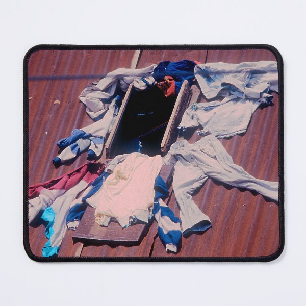 Item preview, Madagascar: Drying Clothes In Window On Tin Roof designed and sold by DEC02.