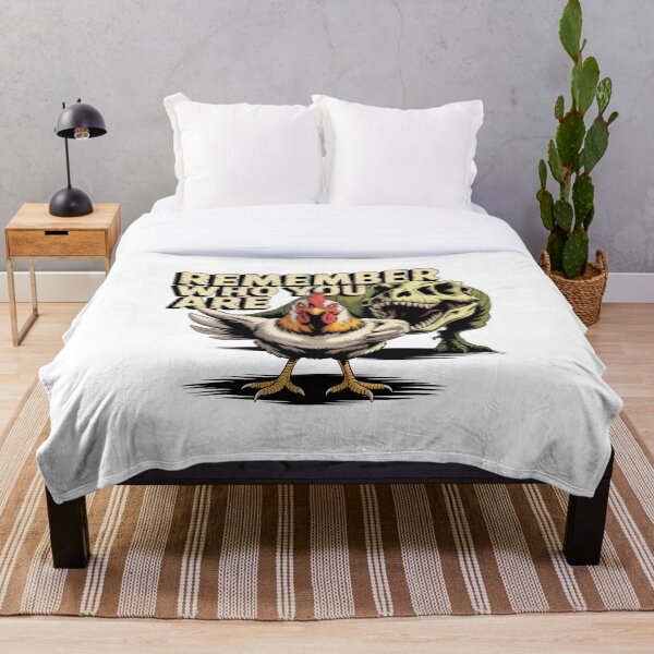 Aperçu de l'œuvre Souviens-toi qui tu es - T-shirt graphique motivant avec poulet et T-Rex créée et vendue par MerchlyMike.