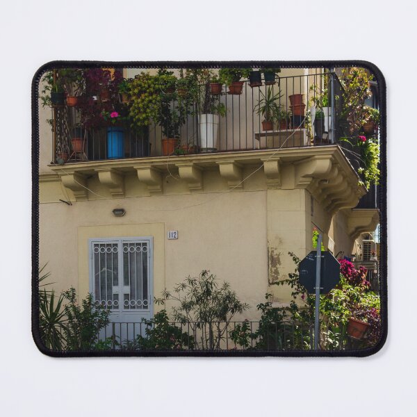 Item preview, Balcony Garden With Potted Plants On a Beige City Building Facade, Sunlit Urban Residence designed and sold by Nmallia.