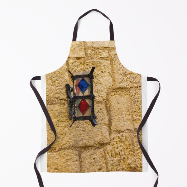 Item preview, Vintage Stained Glass Wall Lantern Mounted On Weathered Stone Wall In Sunny Alleyway designed and sold by Nmallia.