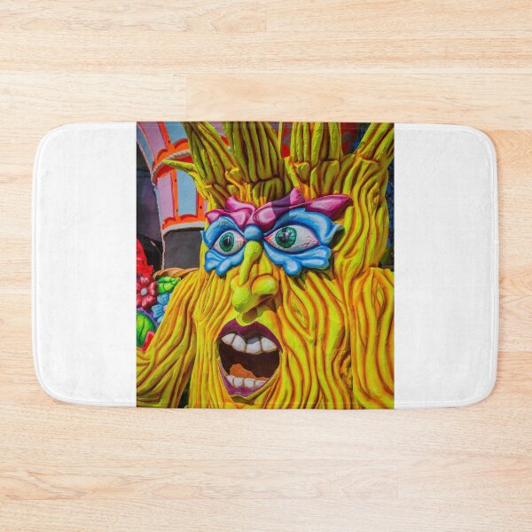Item preview, Colorful Carnival Float Sculpture With Expressive Masked Face And Wood-Like Texture At Festival designed and sold by Nmallia.