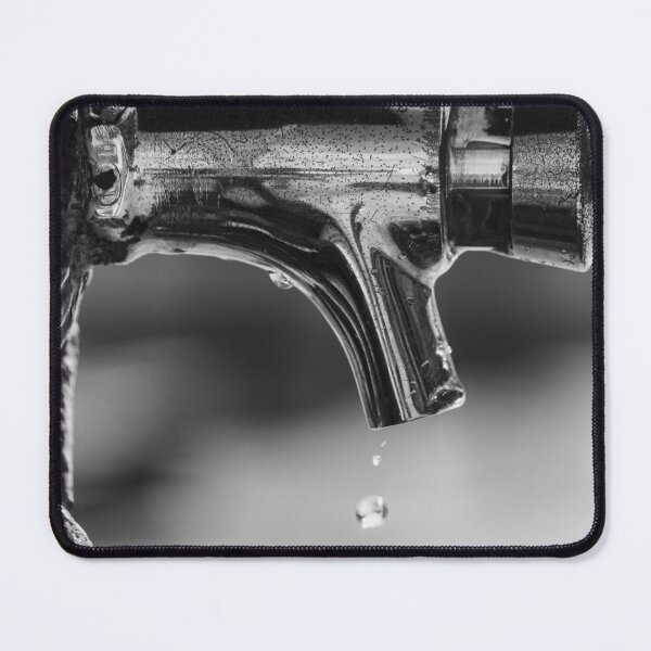 Item preview, Close-Up Of Dripping Metal Faucet Tap With Water Drop In Black And White Minimalist Detail designed and sold by Nmallia.