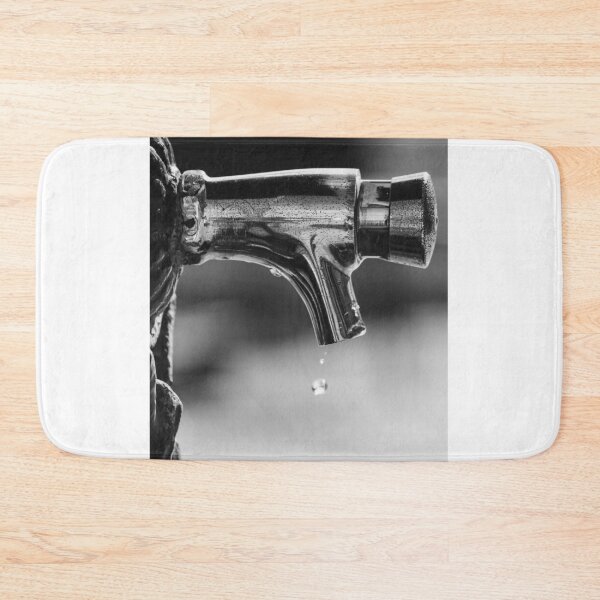 Item preview, Close-Up Of Dripping Metal Faucet Tap With Water Drop In Black And White Minimalist Detail designed and sold by Nmallia.