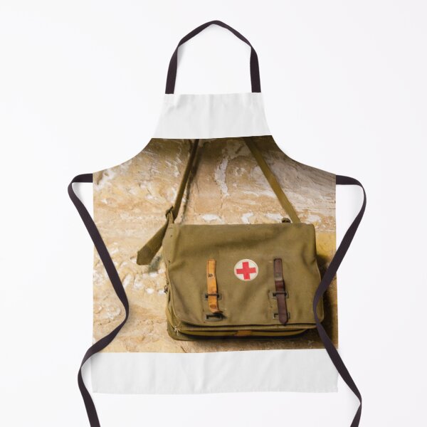 Item preview, Vintage Red Cross Canvas Medical Bag Hanging on Stone Wall, Military First Aid Satchel designed and sold by Nmallia.