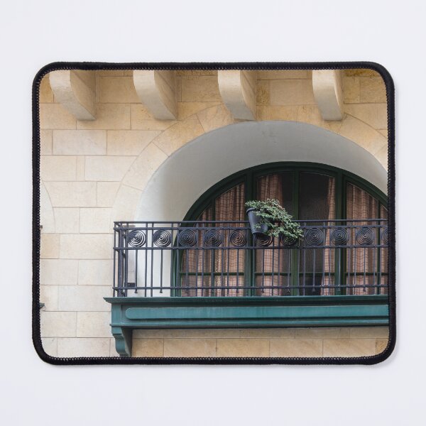 Item preview, Arched Balcony With Iron Railing And Potted Plant On Warm Stone Facade designed and sold by Nmallia.