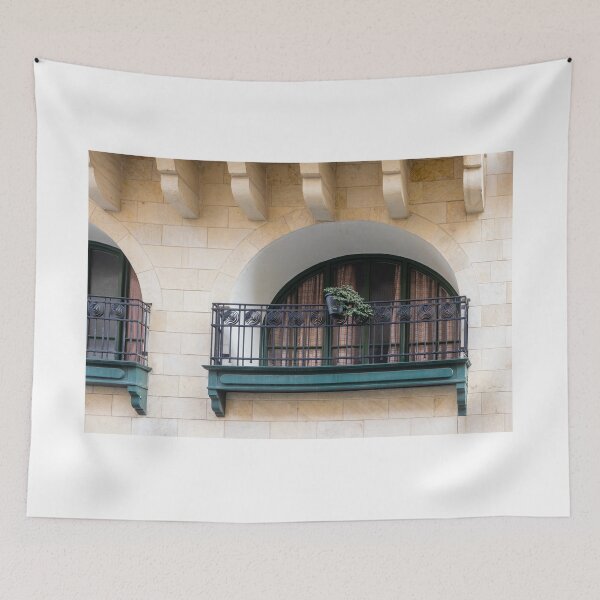Item preview, Arched Balcony With Iron Railing And Potted Plant On Warm Stone Facade designed and sold by Nmallia.