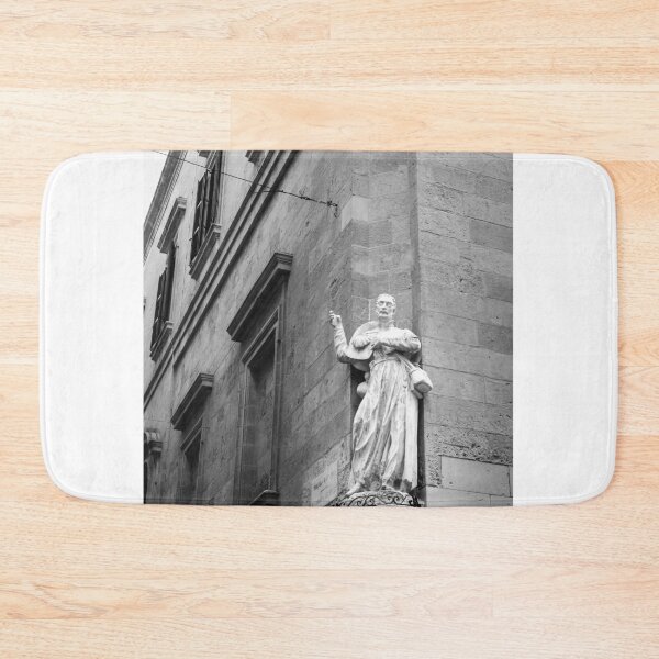 Item preview, Historic Stone Statue On Corner Of Old Building In Black And White Urban Architecture Photograph designed and sold by Nmallia.