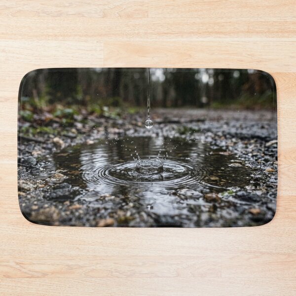 Item preview, Water droplet falling into a puddle – realistic close-up and motion effect. designed and sold by Malisa345.