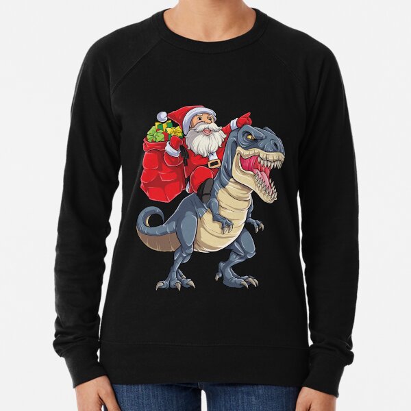 Artikel-Vorschau von Santa Reiten Dinosaurier T rex T Hemd Weihnachten Geschenke Weihnachten Kinder Jungen Mädchen Mann Frauen, designt und verkauft von LiqueGifts.