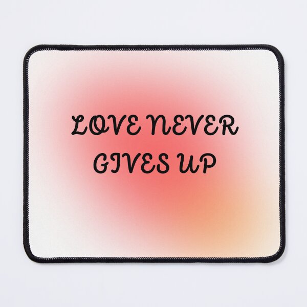 Item preview, Love Never Gives Up Romantic Quote | Soft Pink Aesthetic Heart Shirt designed and sold by Homelife3.