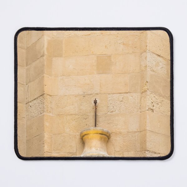 Item preview, Historic Sandstone Wall With Decorative Stone Urn And Iron Anchor On Building Façade designed and sold by Nmallia.