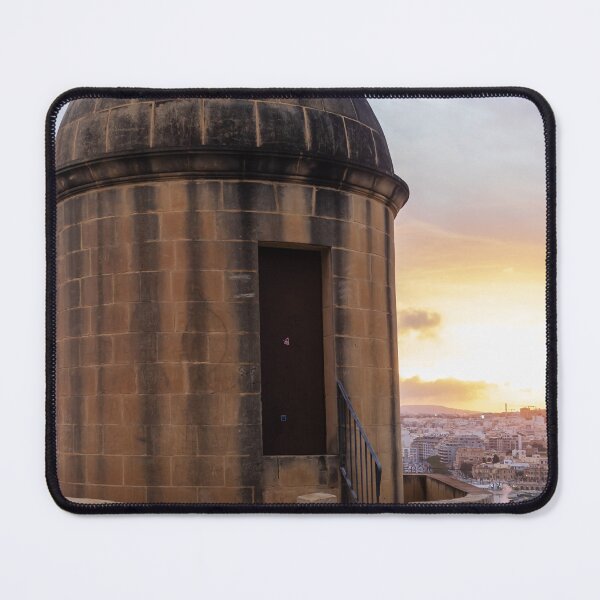 Item preview, Historic Stone Watchtower Turret Overlooking City Skyline at Sunset With Dramatic Sky designed and sold by Nmallia.