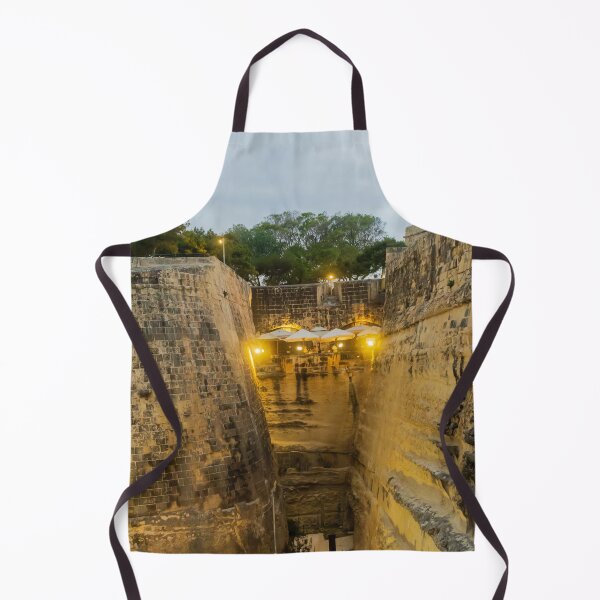 Item preview, Historic Stone Fortress Walls With Lit Terrace Cafe And Narrow Moat At Dusk designed and sold by Nmallia.