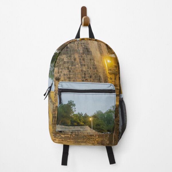 Item preview, Historic Stone Fortress Walls With Lit Terrace Cafe And Narrow Moat At Dusk designed and sold by Nmallia.