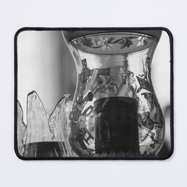 Item preview, Vintage Ornate Glass Lamp With Floral Design and Metal Base in Black and White Close-Up designed and sold by Nmallia.