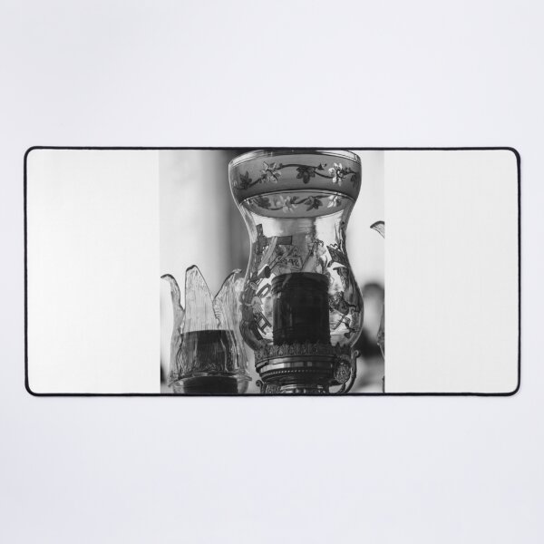Item preview, Vintage Ornate Glass Lamp With Floral Design and Metal Base in Black and White Close-Up designed and sold by Nmallia.