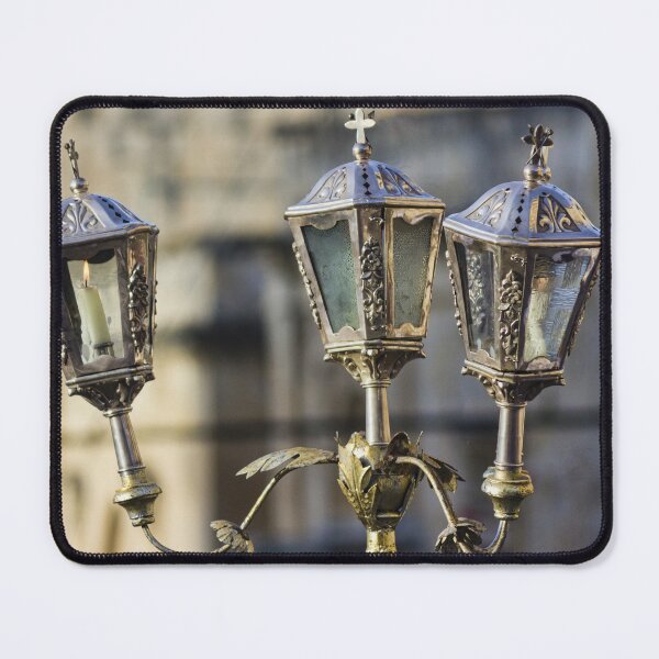 Item preview, Ornate Vintage Brass Lantern With Lit Candle Outside Historic Church — Three-Arm Decorative Street Lamp designed and sold by Nmallia.