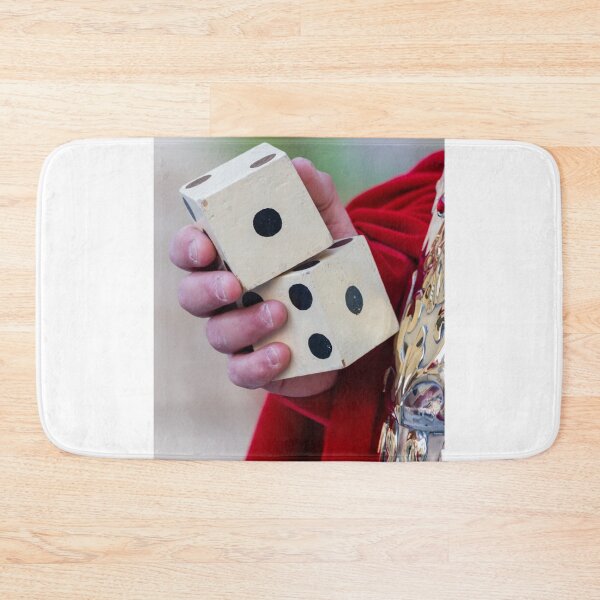 Item preview, Close-Up Of Hand Holding Vintage Wooden Dice Over Red Robe Symbolizing Chance, Luck And Gambling designed and sold by Nmallia.