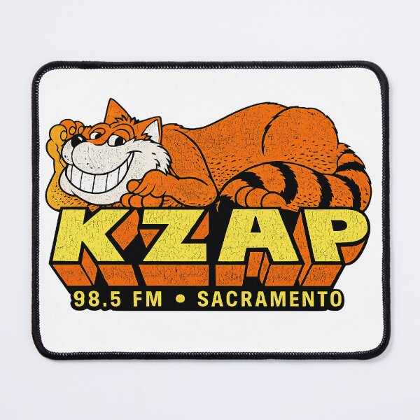 Item preview, Vintage-inspired KZAP 98.5 FM Sacramento logo featuring a laid-back cartoon orange tabby cat lounging across bold retro block lettering. designed and sold by PIXEL POP DESIGNS - Beyond the Norm!.