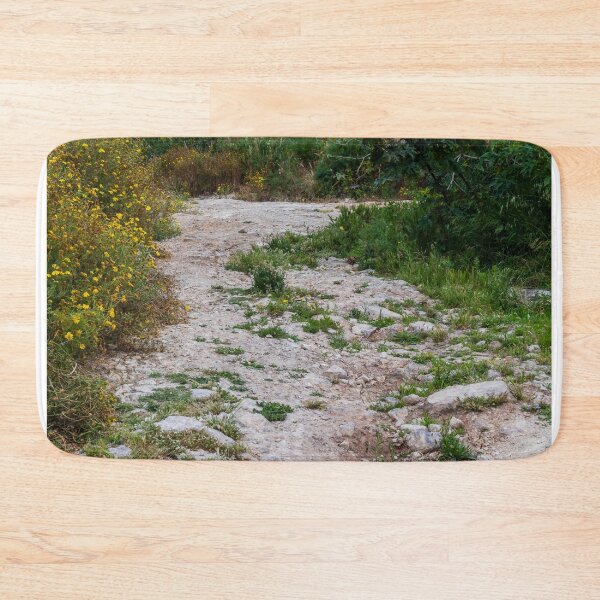 Item preview, Dirt Path Through Yellow Wildflowers and Rocky Ground Along a Quiet Countryside Trail designed and sold by Nmallia.