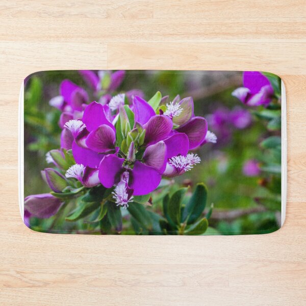 Item preview, Vibrant Purple Flower Bloom On Flowering Shrub Close-Up With Green Foliage And Bokeh Background designed and sold by Nmallia.