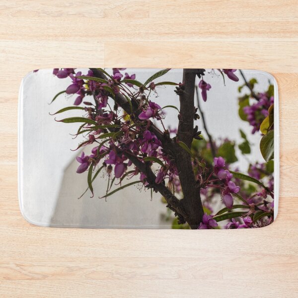 Item preview, Purple Tree Blossoms On Branch With Delicate Spring Flowers Against Soft Urban Sky designed and sold by Nmallia.