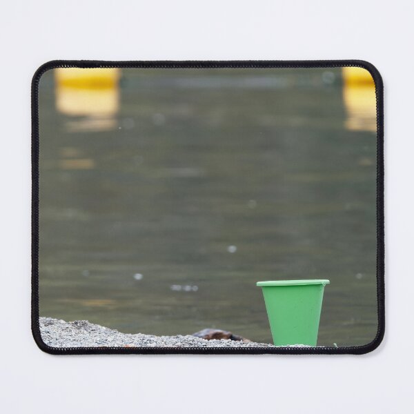 Item preview, Abandoned green plastic bucket on lakeshore designed and sold by lisavonbiela.