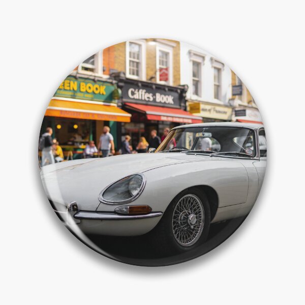 Item preview, White 1961 Jaguar E-Type in City Street – Classic Vintage Car Wall Art Print designed and sold by BlareBlare.