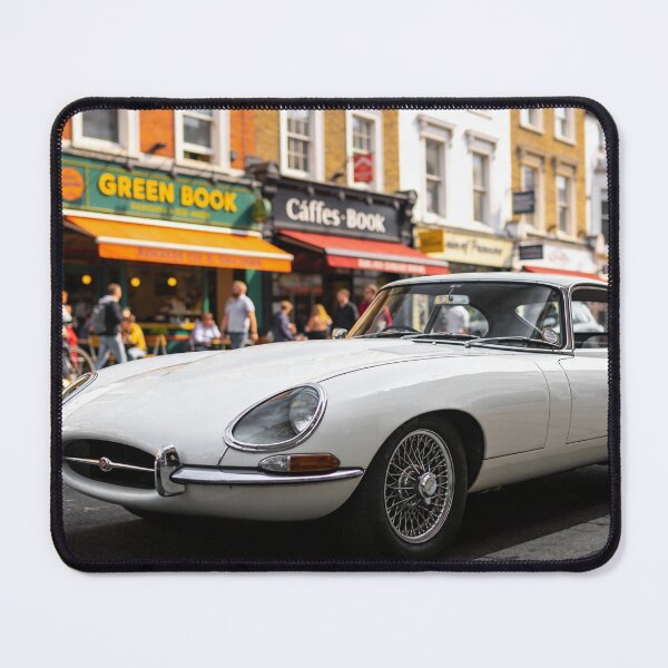 Item preview, White 1961 Jaguar E-Type in City Street – Classic Vintage Car Wall Art Print designed and sold by BlareBlare.