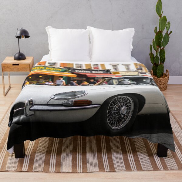 Item preview, White 1961 Jaguar E-Type in City Street – Classic Vintage Car Wall Art Print designed and sold by BlareBlare.