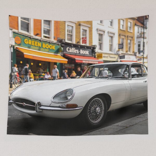Item preview, White 1961 Jaguar E-Type in City Street – Classic Vintage Car Wall Art Print designed and sold by BlareBlare.