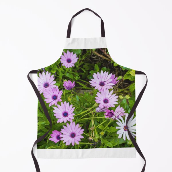 Item preview, Purple Daisy Flowers Clustered Among Green Leaves in a Vibrant Garden Close-Up designed and sold by Nmallia.