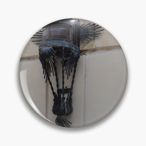 Item preview, Vintage Wrought Iron Lantern Wall Sconce Mounted On Stone Facade With Ornate Metalwork designed and sold by Nmallia.