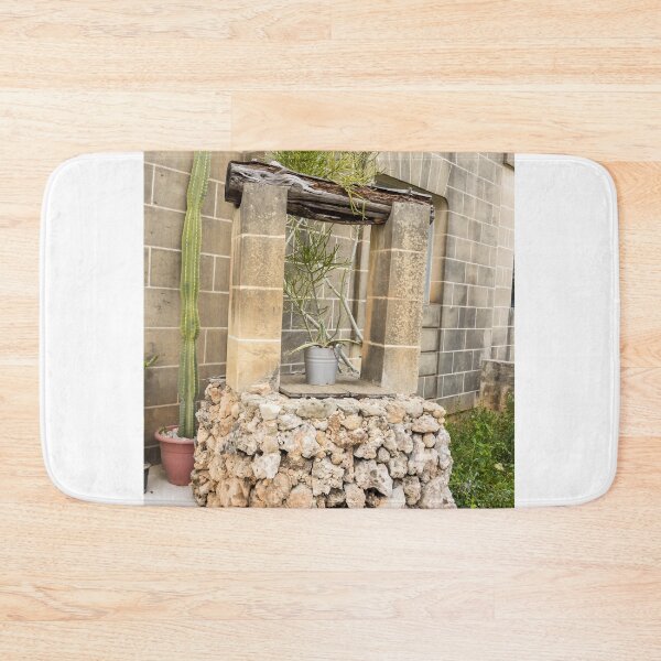 Item preview, Rustic Stone Well and Potted Cactus in a Sunny Mediterranean Courtyard With Weathered Columns designed and sold by Nmallia.