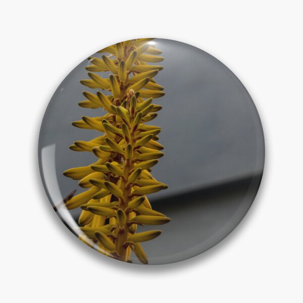 Item preview, Yellow Aloe Flower Spike Against Modern Gray Building Urban Architecture Vertical Close-Up designed and sold by Nmallia.
