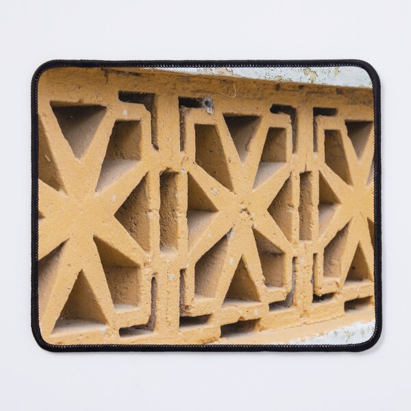 Item preview, Close-Up Of Decorative Yellow Concrete Breeze Block Wall With Geometric Star Pattern And Weathered Texture designed and sold by Nmallia.