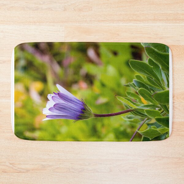 Item preview, Close-Up Purple Daisy Bud in Garden With Green Leaves and Soft Background designed and sold by Nmallia.