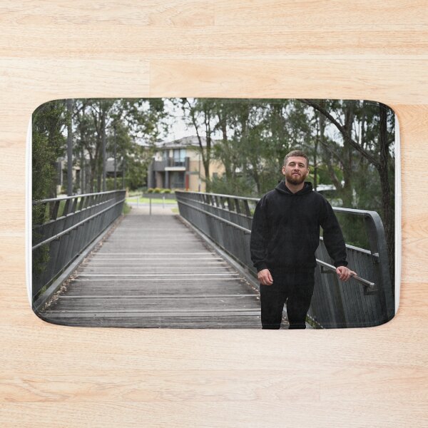 Item preview, James Rolevski leaning on wooden bridge in nature designed and sold by getmybookstore.