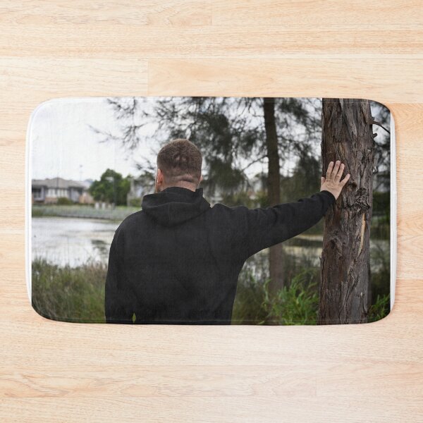 Item preview, Man looks at lake with hand on tree designed and sold by getmybookstore.