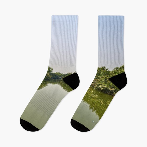 Item preview, A peaceful canal nestled in dense vegetation designed and sold by franck380.