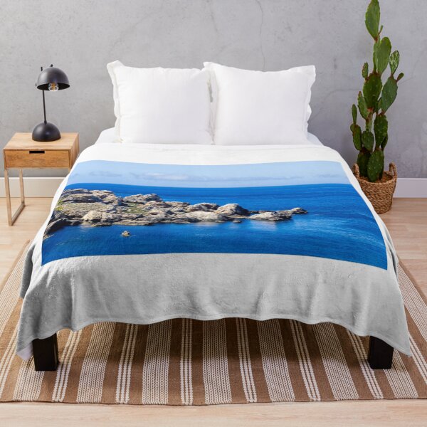 Item preview, Rocky Coastline Over Deep Blue Sea With Calm Waters And Sunny Coastal Rocks designed and sold by Nmallia.