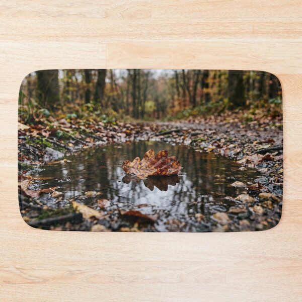 Item preview, Dead leaf floating on a puddle designed and sold by Malisa345.
