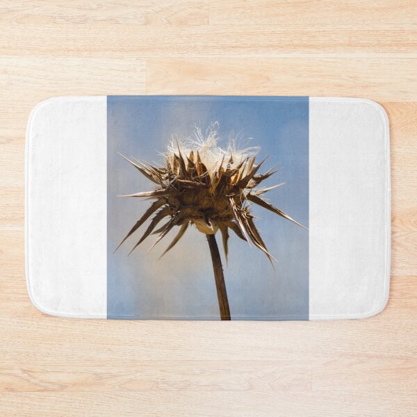 Item preview, Sunlit Dried Thistle Seed Head Against Blue Sky — Spiky Wildflower Macro Autumn Detail designed and sold by Nmallia.