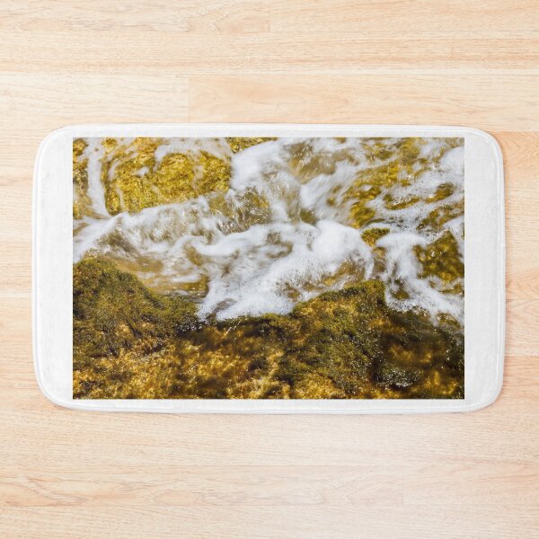Item preview, Close-Up Of Sea Water Flowing Over Algae-Covered Rocks With White Surf And Foam designed and sold by Nmallia.