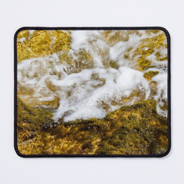 Item preview, Close-Up Of Sea Water Flowing Over Algae-Covered Rocks With White Surf And Foam designed and sold by Nmallia.