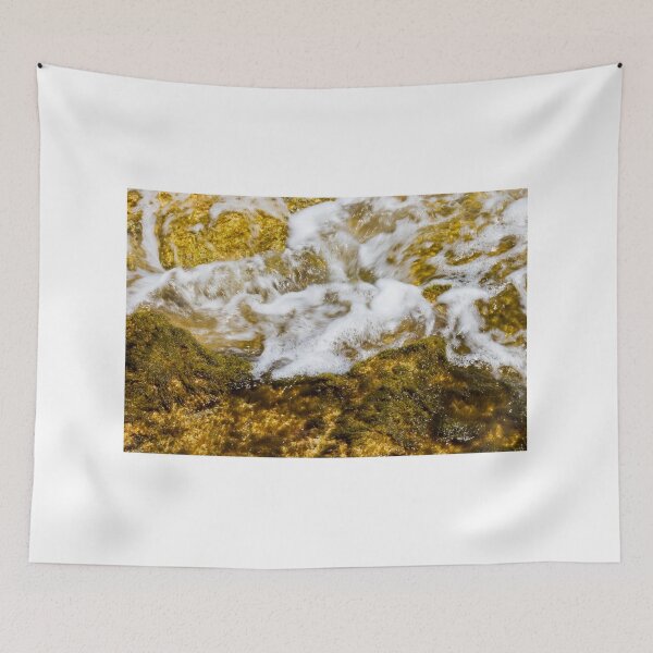 Item preview, Close-Up Of Sea Water Flowing Over Algae-Covered Rocks With White Surf And Foam designed and sold by Nmallia.
