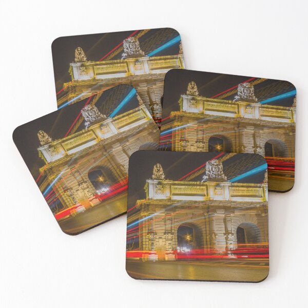 Item preview, Nighttime Long Exposure Of Historic City Arch With Colorful Light Trails And Passing Traffic designed and sold by Nmallia.