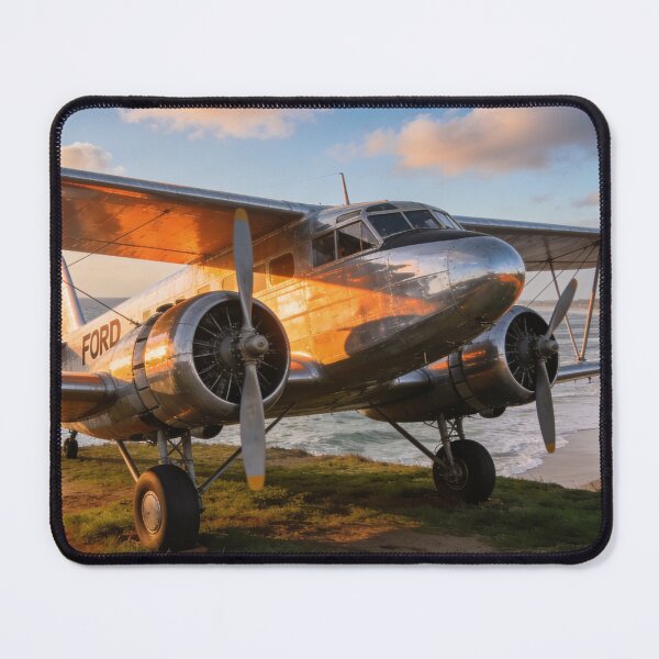 Item preview, Ford Trimotor on Coastal Cliff – Ocean View Vintage Airplane Artwork designed and sold by BlareBlare.