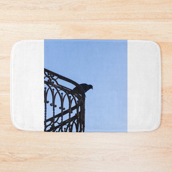 Item preview, Pigeon Silhouette Perched on Wrought Iron Balcony Railing Against Clear Blue Sky at Dusk designed and sold by Nmallia.